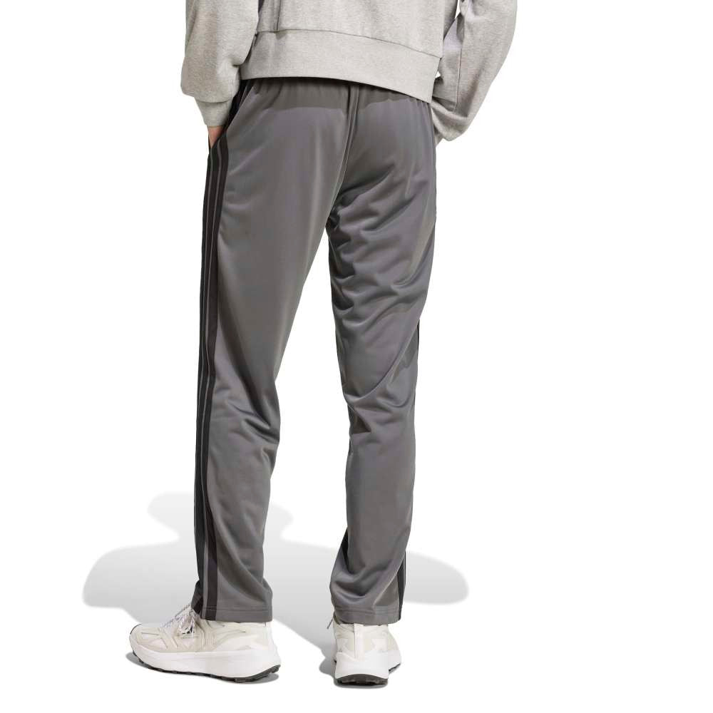 بنطلون رياضي بثلاثة خطوط من التريكو بقصّة عادية وحاشية مفتوحة