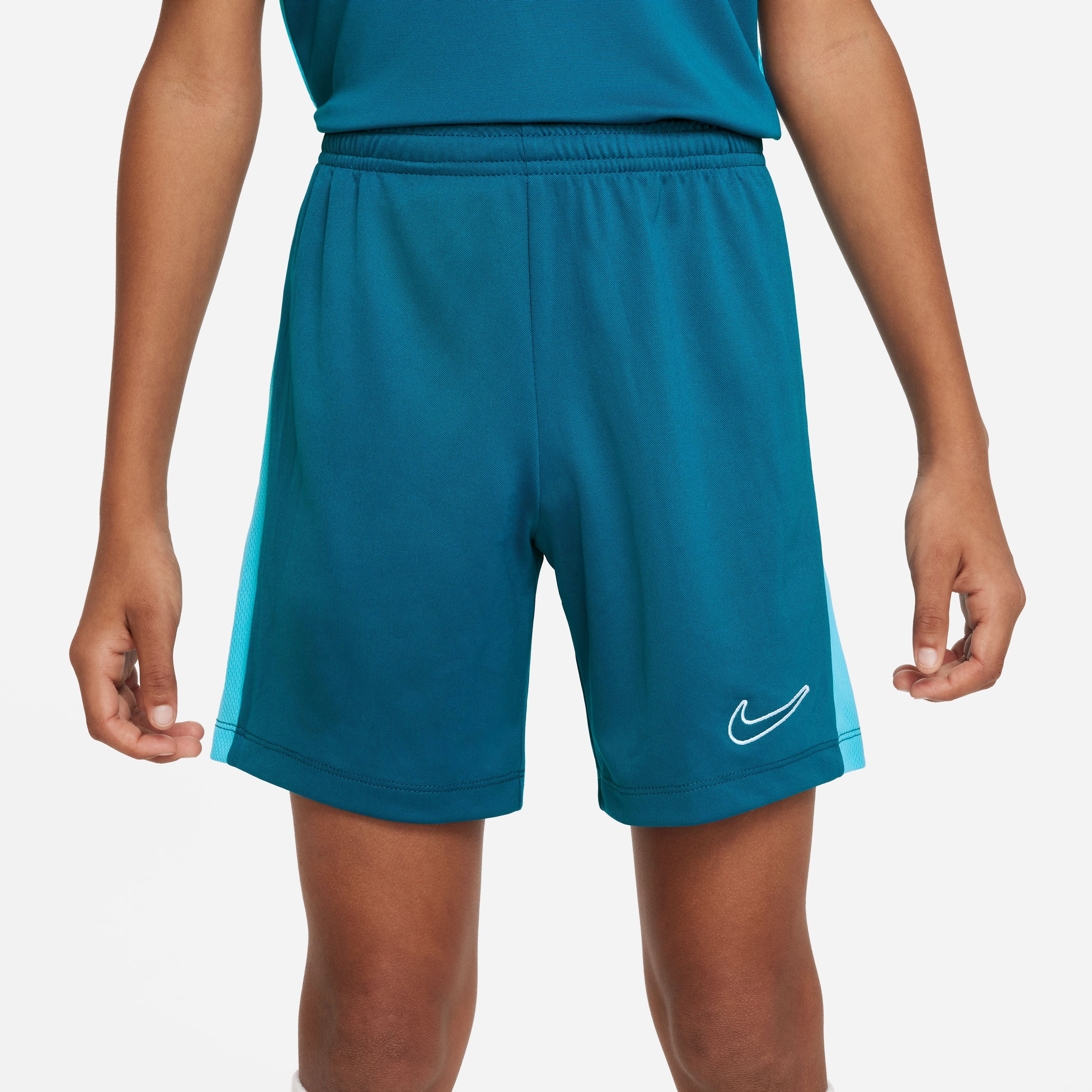 green nike football shorts